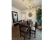 Bright dining room with a six-chair table and chandelier at 8800 Roping Rodeo Ave # 103, Las Vegas, NV 89178