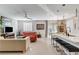 Modern living area adjacent to the kitchen, showcasing a stylish, open concept design at 889 Ariel Heights Ave, Las Vegas, NV 89138