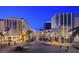 Illuminated street view of the open air mall shows an inviting retail and entertainment experience for residents at 889 Ariel Heights Ave, Las Vegas, NV 89138