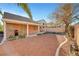 Covered patio, gravel yard, and BBQ area at 9008 Rusty Rifle Ave, Las Vegas, NV 89143