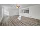 Spacious bedroom with wood-look floors and high ceilings at 9008 Rusty Rifle Ave, Las Vegas, NV 89143