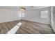 Spacious bedroom featuring wood-look floors at 9008 Rusty Rifle Ave, Las Vegas, NV 89143