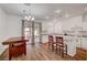 Kitchen with white cabinets, granite countertops, and an island at 9008 Rusty Rifle Ave, Las Vegas, NV 89143