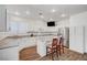 Modern kitchen with white cabinets, granite counters, and stainless steel appliances at 9008 Rusty Rifle Ave, Las Vegas, NV 89143