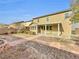 Backyard view showing patio and gravel landscaping at 9609 Rolling Thunder Ave, Las Vegas, NV 89148