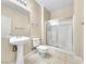 Clean bathroom featuring a shower and pedestal sink at 9609 Rolling Thunder Ave, Las Vegas, NV 89148