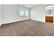 Spacious carpeted bedroom with large windows at 9609 Rolling Thunder Ave, Las Vegas, NV 89148