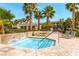 Community hot tub with ample seating at 10809 Garden Mist Dr # 2093, Las Vegas, NV 89135