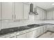 Kitchen countertop with a gas stove and white backsplash at 11579 Salt Creek Ave, Las Vegas, NV 89138