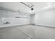 Garage with sealed concrete floors and overhead storage at 11579 Salt Creek Ave, Las Vegas, NV 89138