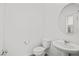 Simple and updated bathroom with pedestal sink and toilet at 2932 Torreon Ln, Las Vegas, NV 89121