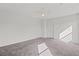 Bright bedroom with ceiling fan and carpet flooring at 2932 Torreon Ln, Las Vegas, NV 89121