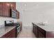 Modern kitchen with stainless steel appliances and granite countertops at 2932 Torreon Ln, Las Vegas, NV 89121