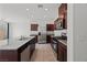 Modern kitchen features stainless steel appliances and granite countertops at 2932 Torreon Ln, Las Vegas, NV 89121