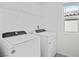 Laundry room with Whirlpool washer and dryer at 2932 Torreon Ln, Las Vegas, NV 89121
