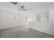 Upper level hallway with ceiling fan and multiple bedroom access at 2932 Torreon Ln, Las Vegas, NV 89121
