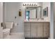 Updated bathroom features a vanity with a large mirror at 3066 Tarpon Dr # 204, Las Vegas, NV 89120