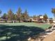 Outdoor basketball court with benches and shade at 3740 Corte Bella Hills Ave, North Las Vegas, NV 89081