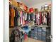 Spacious walk-in closet with ample storage space, including shelves, rods, and organized compartments at 3740 Corte Bella Hills Ave, North Las Vegas, NV 89081