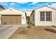 Charming single story home with a two car garage and easy to maintain landscaping at 3740 Corte Bella Hills Ave, North Las Vegas, NV 89081