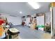 Two car garage offering ample storage and a clean, epoxy coated floor at 3740 Corte Bella Hills Ave, North Las Vegas, NV 89081