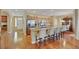 Modern kitchen with granite countertops and hardwood floors at 3740 Corte Bella Hills Ave, North Las Vegas, NV 89081