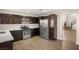 Modern kitchen with stainless steel appliances and ample cabinetry at 4712 Stable Way, North Las Vegas, NV 89032