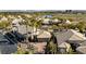 Picture of neighborhood with tile roofs, green lawns, and palm tree landscaping at 520 Summer Mesa Dr, Las Vegas, NV 89144