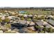 Aerial view of a beautiful community with lush green golf course and serene lake at 520 Summer Mesa Dr, Las Vegas, NV 89144