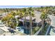 This aerial view shows a backyard oasis featuring a pool and spa surrounded by lush landscaping at 520 Summer Mesa Dr, Las Vegas, NV 89144