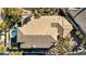 Aerial view of the house showcasing the tile roof, pool, and beautifully landscaped yard at 520 Summer Mesa Dr, Las Vegas, NV 89144