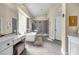 Luxurious bathroom with soaking tub, walk-in shower, and double vanity at 520 Summer Mesa Dr, Las Vegas, NV 89144
