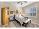 Bright bedroom with wood floors and a view from the window at 520 Summer Mesa Dr, Las Vegas, NV 89144
