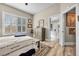 Comfortable bedroom with en-suite bathroom and window shutters at 520 Summer Mesa Dr, Las Vegas, NV 89144