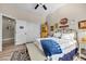 Cozy bedroom with a charming yellow cabinet and decorative items at 520 Summer Mesa Dr, Las Vegas, NV 89144
