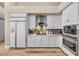 Modern kitchen featuring stainless steel appliances and white cabinetry at 520 Summer Mesa Dr, Las Vegas, NV 89144
