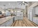 Spacious kitchen with white cabinets, granite countertops, and stainless steel appliances at 520 Summer Mesa Dr, Las Vegas, NV 89144