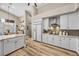 Modern kitchen with white cabinets, stainless steel appliances, and granite countertops at 520 Summer Mesa Dr, Las Vegas, NV 89144