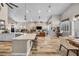 Open concept kitchen with island, breakfast bar, and views into the living room at 520 Summer Mesa Dr, Las Vegas, NV 89144