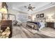 Spacious main bedroom with a king-size bed and ensuite bathroom at 520 Summer Mesa Dr, Las Vegas, NV 89144
