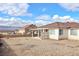 Large backyard with patio cover and mountain views at 53 Flowering Desert Dr, Palm Gardens, NV 89039