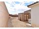 Storage shed and block wall in backyard at 53 Flowering Desert Dr, Palm Gardens, NV 89039