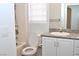 Clean bathroom with granite countertop, single sink, and shower/tub combo at 53 Flowering Desert Dr, Palm Gardens, NV 89039
