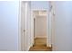 Light and bright hallway with wood-look floors at 53 Flowering Desert Dr, Palm Gardens, NV 89039