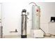 Mechanical room with water heater and water softener at 53 Flowering Desert Dr, Palm Gardens, NV 89039