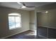 Bright bedroom with large window and ceiling fan at 5524 Big Sky Ln, Las Vegas, NV 89149