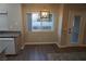 Bright dining area with wood flooring and a view to backyard at 5524 Big Sky Ln, Las Vegas, NV 89149