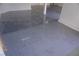 Spacious two-car garage with epoxy coated floor at 5524 Big Sky Ln, Las Vegas, NV 89149