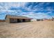 Wide open backyard, showing off the home's exterior features and lot size at 5841 Genoa Ave, Pahrump, NV 89060