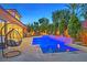Resort-style backyard oasis with a large pool and spa at 65 Garibaldi Way, Henderson, NV 89011